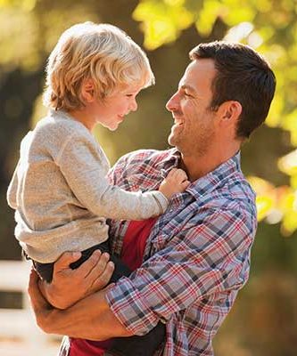 A father holding his son